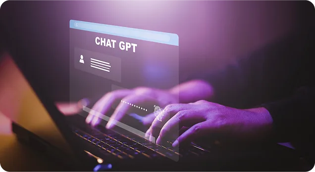 Hands typing on a laptop keyboard with a translucent ChatGPT interface overlay above the keys.